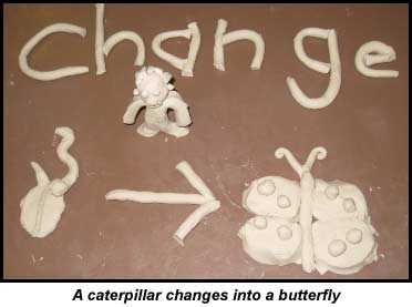 A clay model showing a caterpillar on theleft with an arrow pointing to a butterfly on the right.  Clay modelling is a technique used to improve reading and math comprehension in individuals with learning disabilities.